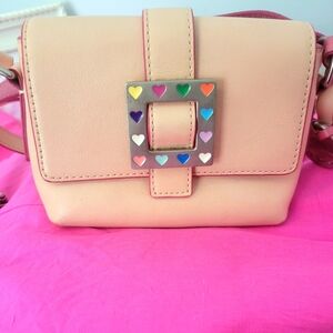 Dooney and Bourke Peach/Pink Mini Bag. Measures 7x5x3 inches